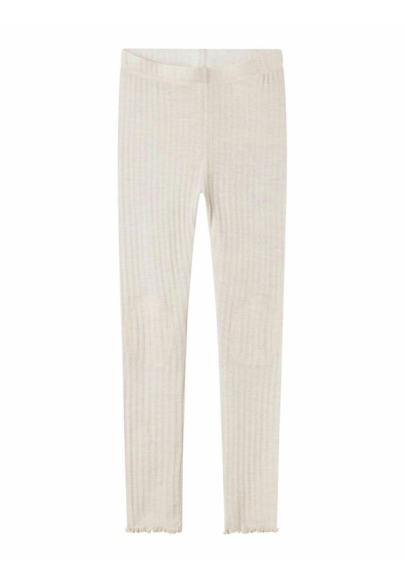 Leggings en tissu léger et côtelé dans une teinte claire. Comprend des patchs aux genoux et des bords effilochés. Texture douce avec une taille élastique.
