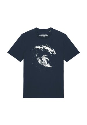 T-shirt bleu foncé avec un graphisme blanc représentant un astronaute surfant sur une vague faite d'étoiles et de poussière cosmique.