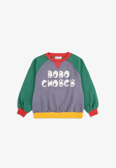 Felpa grigia con accenti verdi, rossi e gialli, caratterizzata da un neckline rotondo e maniche a sbuffo. "BOBO CHOSES" stampato in bianco.