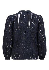 Námořnická modrá blůza s vyšitými vzory a výřezovými detaily, dlouhými nabíranými rukávy a zipovým zapínáním na zádech. Texturovaná tkanina.