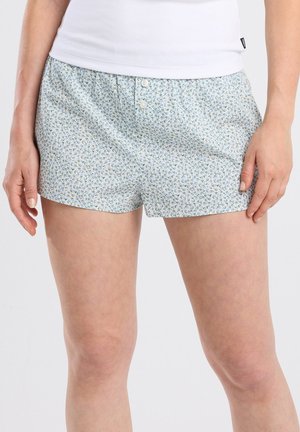 Light blue boxer shorts featuring a small floral pattern, elastic waistband, and two buttons at the front. Made of soft fabric.