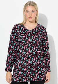 Dlouhá černá tunika s barevným vzorem cukrovinek a borovic v růžové a modro-zelené. Výstřih do V s volným střihem. Měkká, elastická tkanina.