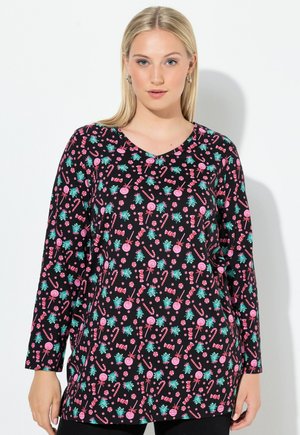 Langärmlige schwarze Tunika mit einem bunten Muster aus Süßigkeiten und Tannen in Rosa und Türkis. V-Ausschnitt-Design mit lockerer Passform. Weicher, dehnbarer Stoff.
