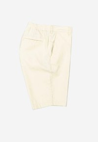 Beige cotton shorts with an elastic waistband, featuring a single back pocket and a relaxed fit, suitable for casual wear.