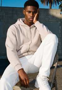 Karl Kani SMALL SIGNATURE TEDDY TROYER UNISEX  - Fleece jumper - light sand