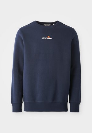 Sudadera azul marino hecha de una tela suave, con cuello redondo y puños acanalados. Logo "ellesse" bordado con acentos de color.