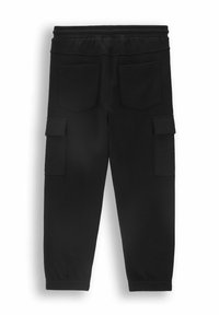 Czarna dresowa spodnie z elastycznym paskiem, dwoma tylnymi kieszeniami i dwiema bocznymi kieszeniami cargo. Wykonane z miękkiego, gładkiego materiału.