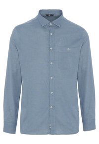 Camicia azzurra chiara a maniche lunghe realizzata in un tessuto testurizzato. Presenta un colletto e una tasca sul petto con un bottone.