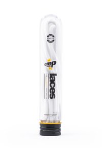 Stringhe bianche tonde per scarpe confezionate in un tubo di plastica trasparente con una base nera e gialla. Presentano il logo del marchio e dettagli del prodotto sul tubo.