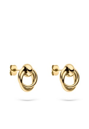 Gold-tone metal stud earrings featuring interlocking circular designs. Smooth texture with polished finish and secure post back closures.