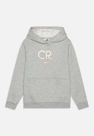 Šedá mikina z bavlněné směsi s klokaní kapsou. Má zlaté logo "CR7" a branding Nike na kapuci. Měkká textura.