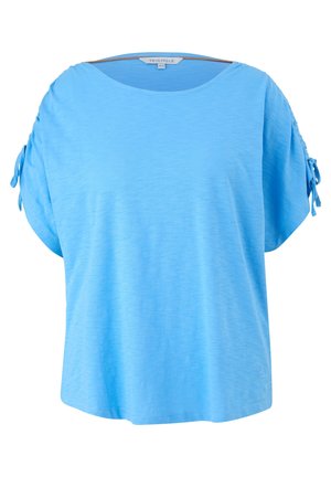 Jasnoniebieska bluzka z krótkim rękawem, okrągłym dekoltem oraz małymi kokardkami na każdym rękawie, rozmiar 44, widoczna metka "Triangle" wewnątrz kołnierza.