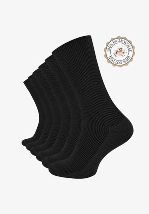 Chaussettes noires en coton, design côtelé, paquet de cinq. Présentent des orteils et des talons renforcés, une texture douce, et une étiquette indiquant 100 % coton.