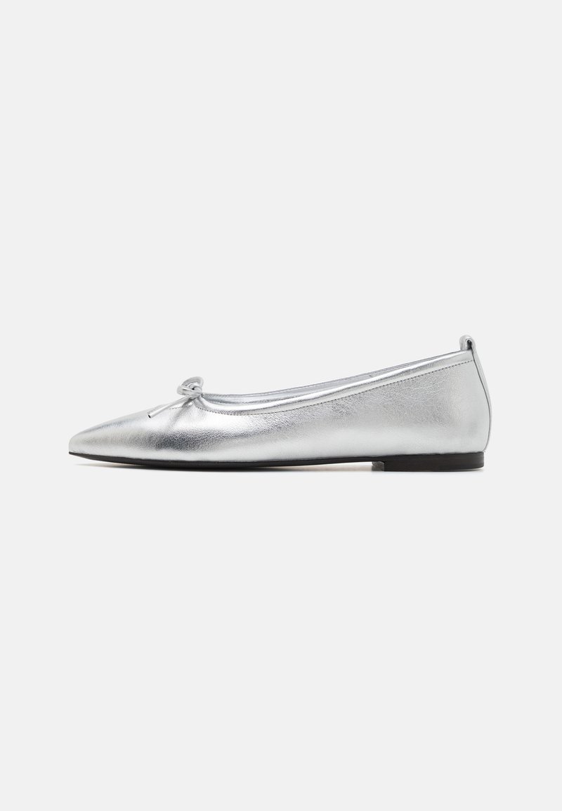 Silver metallic ballet flat with a pointed toe, knotted bow detail, smooth texture, and low-profile black rubber sole.