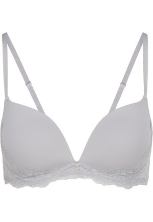 Reggiseno imbottito grigio chiaro con spalline regolabili, bordo in pizzo lungo il margine inferiore e un piccolo charm decorativo al centro davanti.