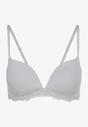 Reggiseno imbottito grigio chiaro con spalline regolabili, bordo in pizzo lungo il margine inferiore e un piccolo charm decorativo al centro davanti.