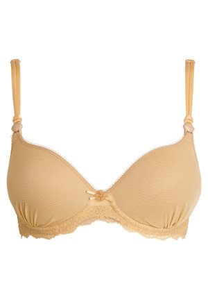 Soutien-gorge rembourré beige avec des bords en dentelle, des bretelles réglables, et un accent en nœud au centre. Texture lisse avec un design sans coutures.