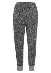 Grå joggebukser med dyreprintmønster, elastisk talje og ribbede manchetter ved anklerne. Lavet af blødt, strækbart stof.