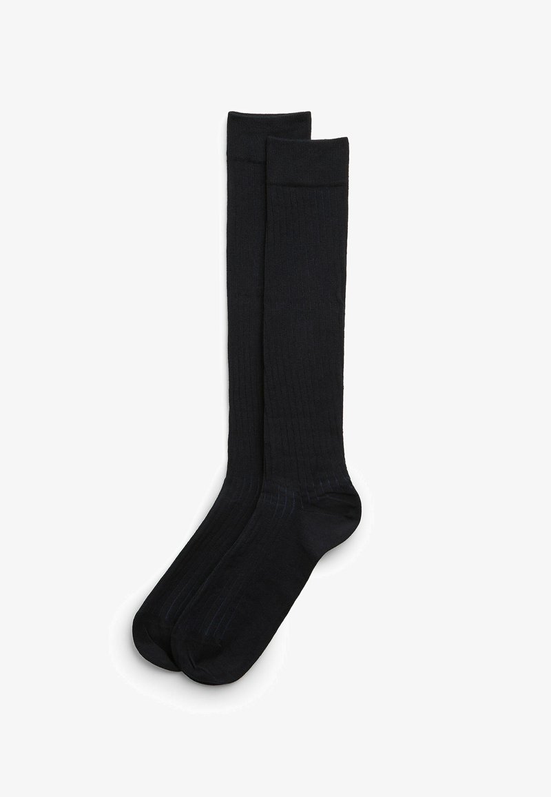 Czarne skarpetki sięgające do kolan o żeberkowanej teksturze, z wzmocnionymi palcami i bezszwowym wzornictwem zapewniającym komfort i trwałość.