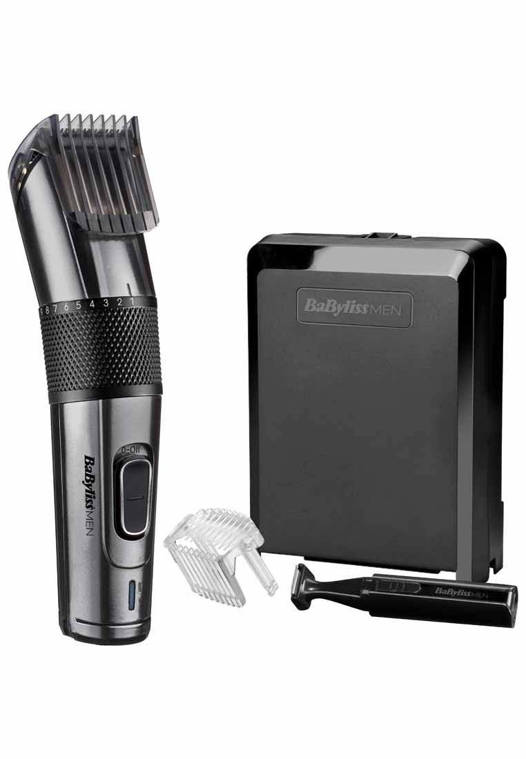 Juego de cortapelos que incluye una recortadora metálica plateada, múltiples peines de plástico, una base recargable negra y una pequeña recortadora para detalles.