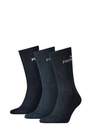 Set aus drei Paar Socken in dunklen Farben. Die Materialien sind geripptes Strickmaterial mit einer strukturierten Oberfläche. Jede Socke hat ein dezentes Logo in der Nähe des Bündchens.