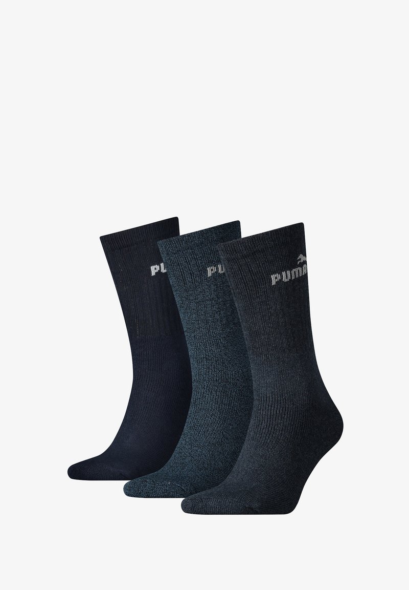 Set aus drei Paar Socken in dunklen Farben. Die Materialien sind geripptes Strickmaterial mit einer strukturierten Oberfläche. Jede Socke hat ein dezentes Logo in der Nähe des Bündchens.