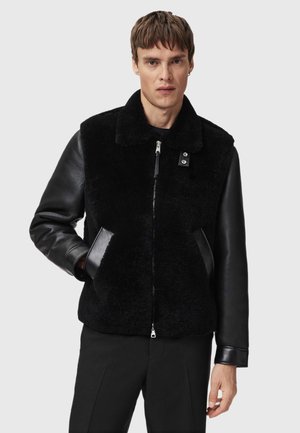 Casaco de couro - black