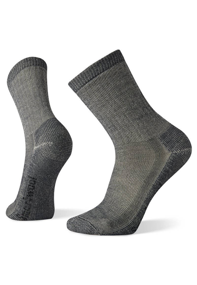 Dunkelgraue knielange Socken mit einer gerippten Textur, verstärkten Fersen und Zehen sowie einem leicht dunkleren Bund zur Akzentuierung.