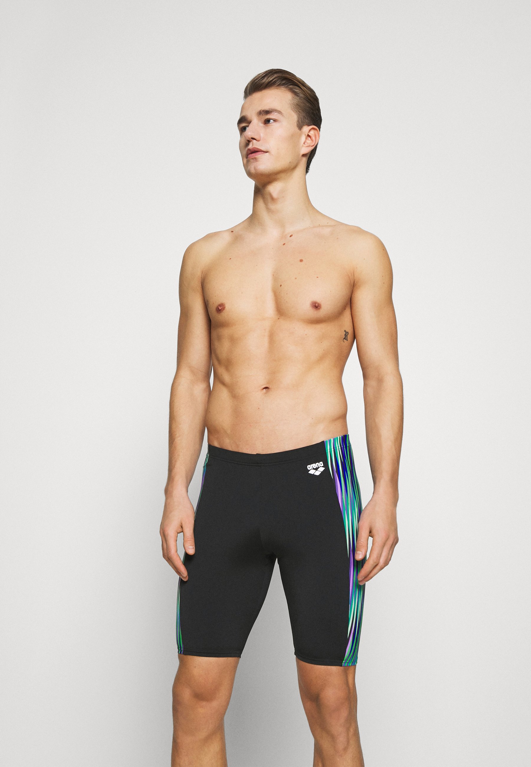 black and green swim trunks