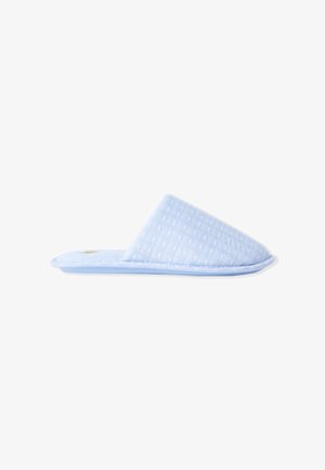 Light blue fabric slipper with a slightly raised, textured pattern and a soft sole. Features an angled upper design for easy wear.