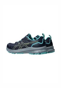 Baskets de course en sentier navy avec des accents turquoise, tige en maille, semelle texturée et logo bien visible. Comprend un talon renforcé et un système de laçage.