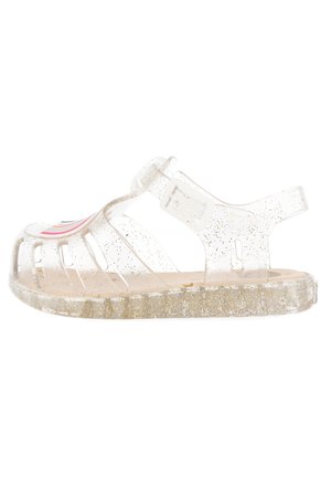 Transparante jelly sandaal met glinsteraccenten, open teen ontwerp, zijspleten, verstelbare riem en een gestructureerde zool.