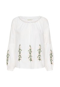Camicia di lino bianca con maniche lunghe, scollo arricciato e ricami floreali verticali in verde e rosa lungo il davanti e le maniche.