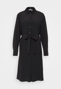 Vestito nero con bottoni, colletto, maniche lunghe e cintura dello stesso tessuto. Texture liscia e design fino al ginocchio senza motivi.