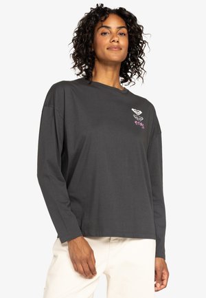 Grey long-sleeve t-shirt in soft fabric with a relaxed fit. Features a colorful graphic design on the left chest area. Plain back.