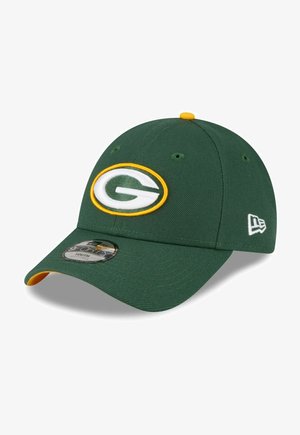 Casquette de baseball verte avec un emblème "G" blanc et doré à l'avant, visière incurvée et accents jaunes sur le bord et le bouton.