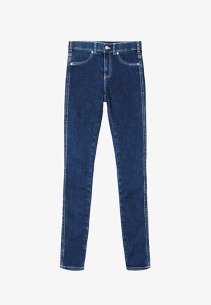 Dark blue skinny jeans made of denim featuring five pockets, a front button, and white stitching along the seams for added detail.