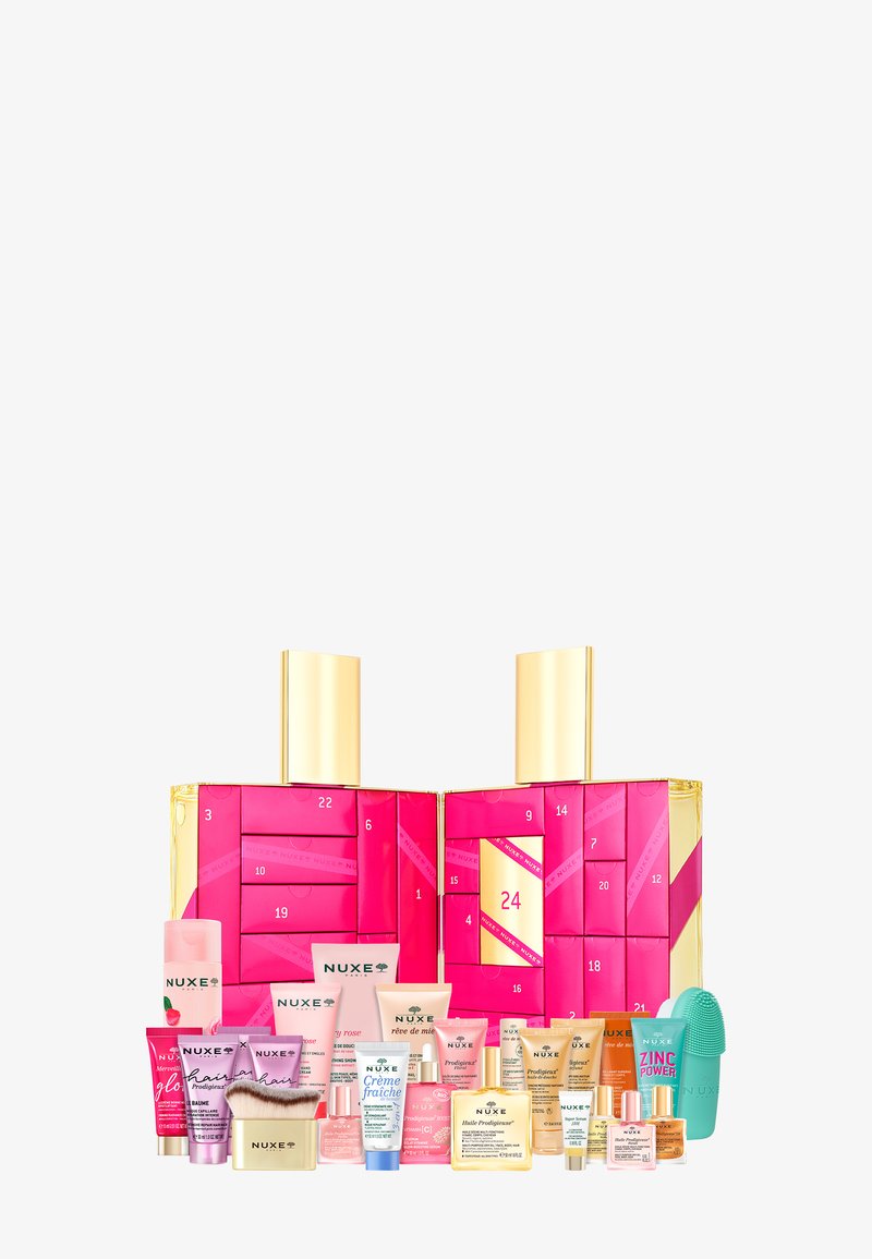 NUXE-Adventskalender in pink-goldener Verpackung, ausgestattet mit 24 Fächern und verschiedenen Hautpflegeprodukten in unterschiedlichen Größen und Farben der Tuben.