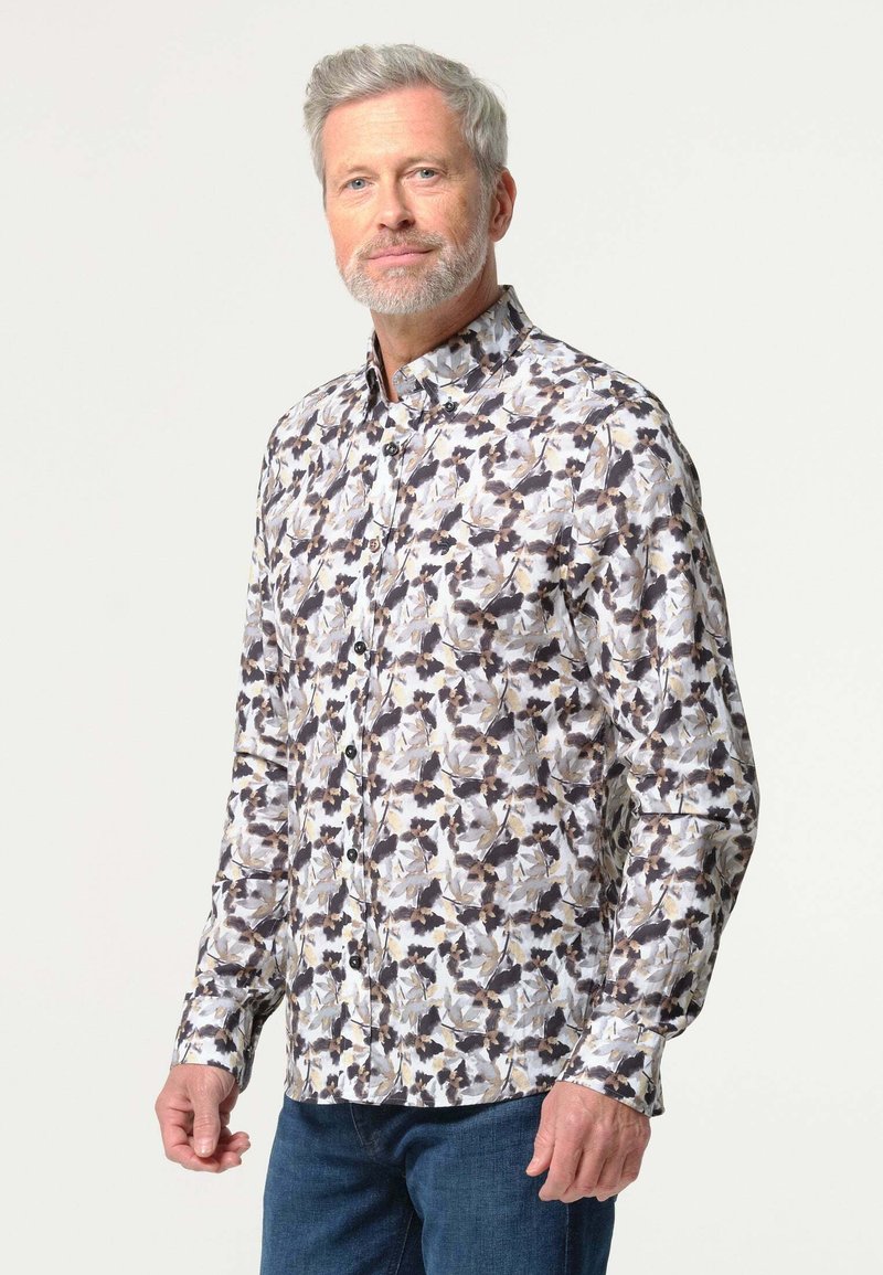 Wit button-up shirt met een bloemenpatroon in zwart, bruin en beige, voorzien van een kraag en lange mouwen. Getextureerde stof, casual pasvorm.
