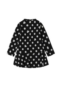 Czarna sukienka z długim rękawem w białe kropki, z marszczoną spódnicą, zapięciem na guziki z tyłu oraz miękką teksturą materiału.