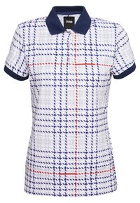 Vit kortärmad polo med marinblå krage. Har ett rutigt mönster i blått och rött. Knappar vid halsområdet och strukturerad tyg.