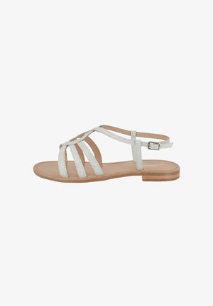 Sandalo strappy grigio chiaro con design testurizzato, suola in legno piatta e fibbia regolabile alla caviglia. Stile minimalista con punta aperta.