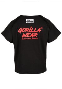 Zwarte t-shirt met korte mouwen en ribbeltextuur. Voorzien van een rood "GORILLA WEAR" logo en de tekst "OLD SCHOOL SERIES" op de voorkant.