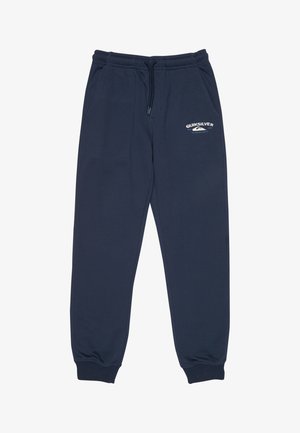 Marineblauwe sweatpants gemaakt van zachte stof, met een tailleband met trekkoord en een wit logo op de linker dij gedrukt. Comfortabele pasvorm.