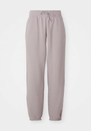 Lys mauve fleece sweatpants med elastisk talje, snor, sidelommer og elastiske manchetter, vist fladt mod en hvid baggrund.