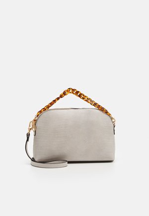 Light gray textured handbag with a short tortoiseshell chain handle and a detachable long strap on a plain white background.