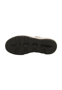 Podešev boty s černým gumovým základem, obsahující vzor pro lepší přilnavost, navržená pro stabilitu a trakci.