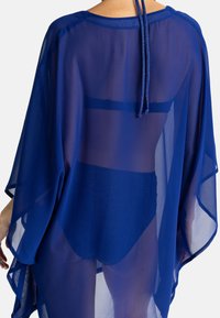 DORINA MOKOLO COVER UP - Rannatarvikud - blue