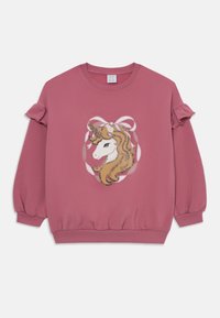 Rosa Sweatshirt mit einem Einhorn-Graphic und goldenen Pailletten, Rüschendetails an den Ärmeln und einem runden Designelement mit einer Schleifendetail.