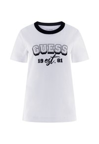 Biely bavlnený tričko s čiernym rebrovaným okrajom okolo krku. Na prednej strane sú veľké čierne písmená "GUESS 19 est. 81". Krátke rukávy.
